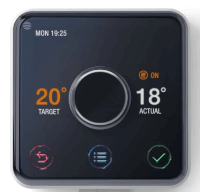 A shiny black thermostat with dials on it