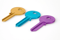 A gold key, a blue key, and a purple key