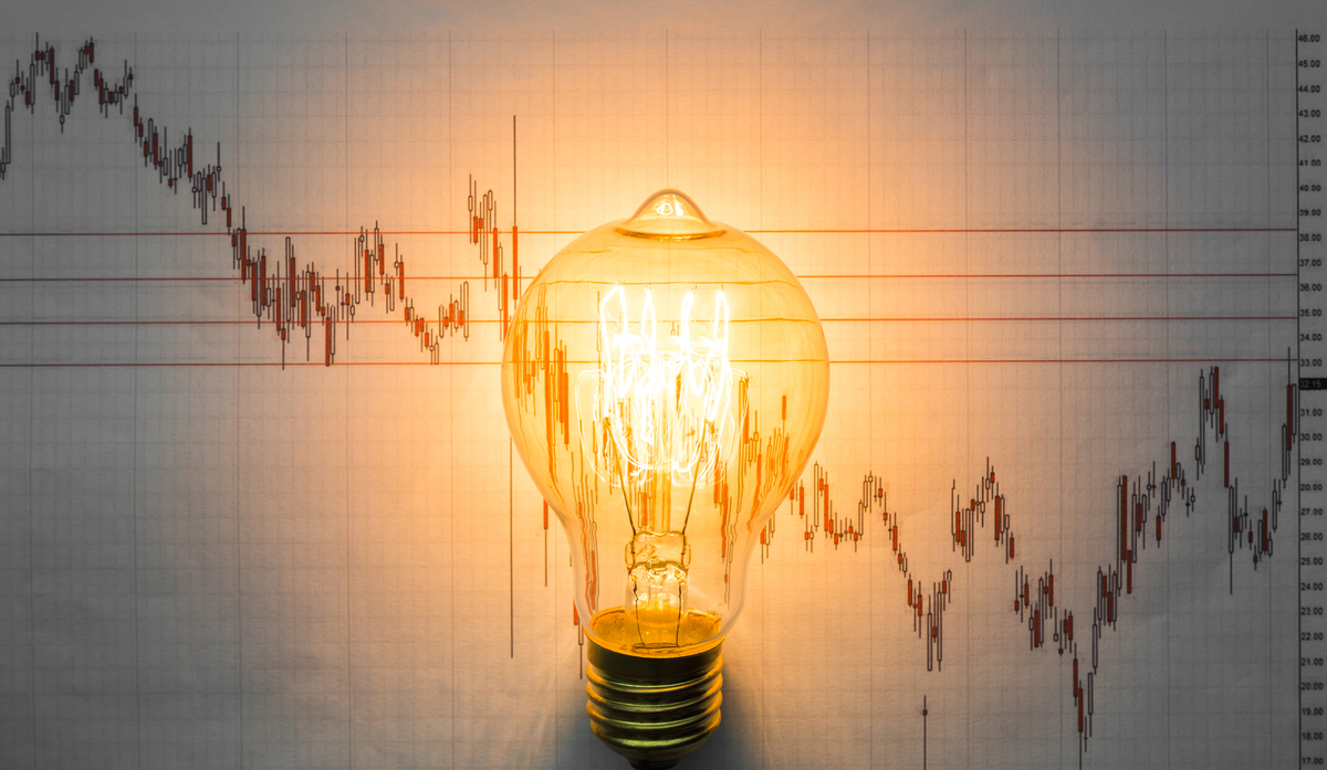 Light Bulb in front of Graph