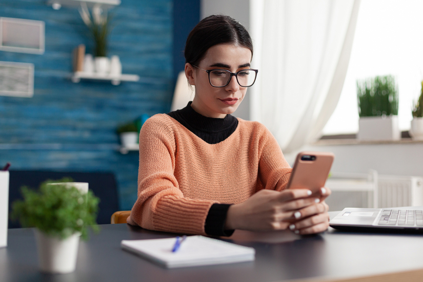 Woman looking at home bills