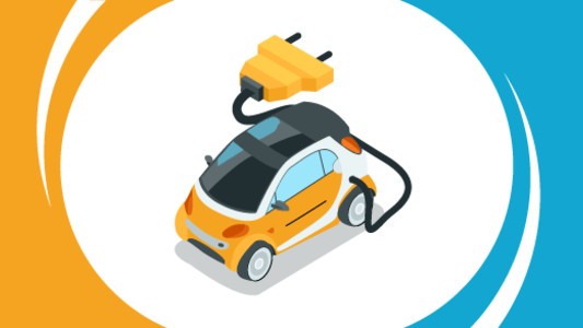 A yellow and black car attached to a plug