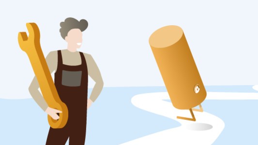 Boiler and a man with a wrench