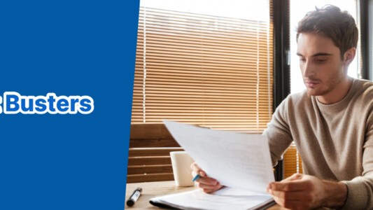 Man looking at household bills