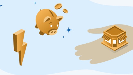 Business near piggy bank and electricity symbol