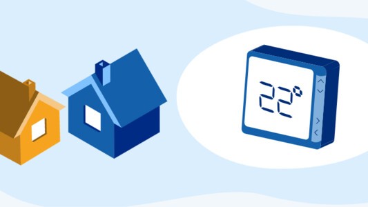 Two houses next to a smart thermostat