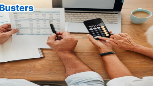 Retired couple looking at bills