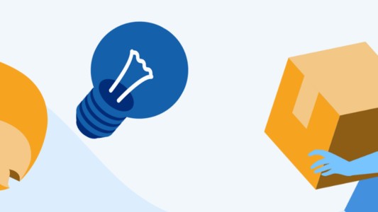 Lightbulb and flame icons next to a woman carrying a box