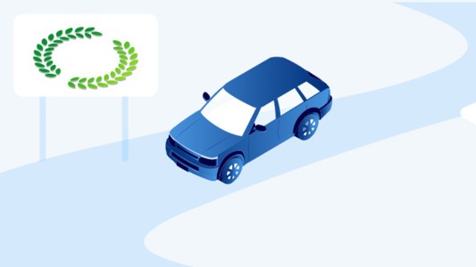 Laurel over a hybrid car driving on a windy road