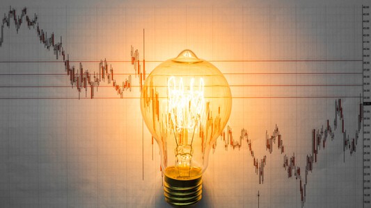 Lightbulb in front of chart